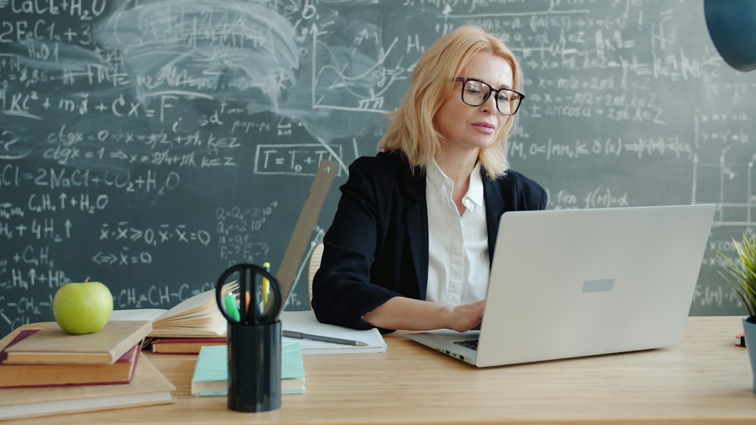 Teacher reviewing an AI-assisted lesson plan before classroom use